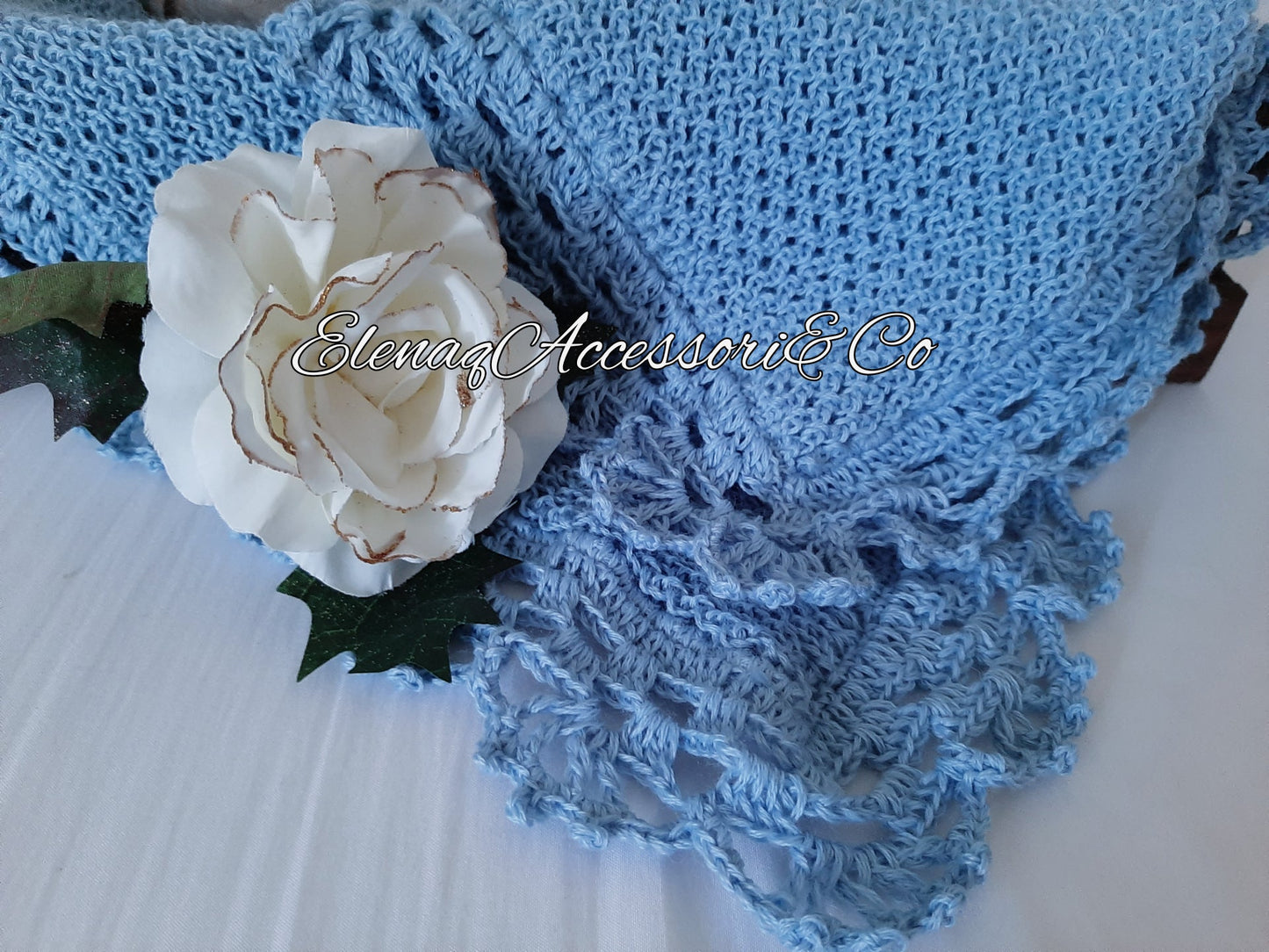 Honeycomb knitted baby blanket with handmade crochet lace, light blue