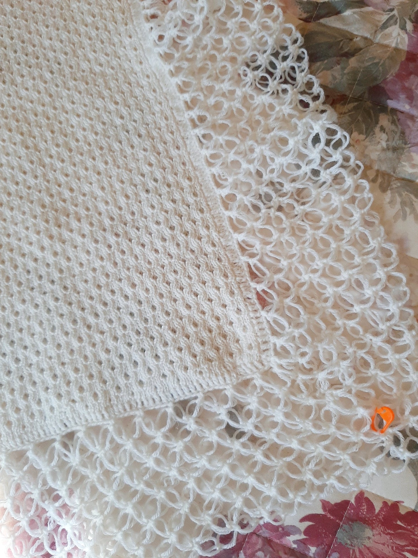 White honeycomb cover with witch stitch edge and blue ribbon